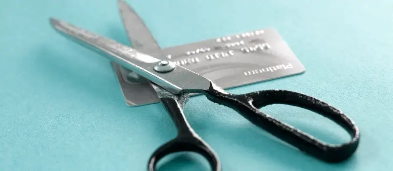 scissors cutting credit card
