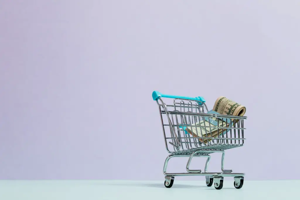 How to stop overspending - cash inside a tiny shopping cart