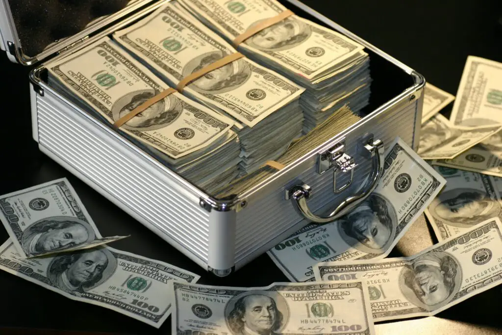 what to do with 50k? grey-metal-case-of-hundred-dollar-bills