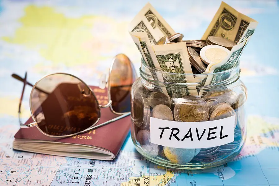 how to budget for travel- travel fund, shades, and passport