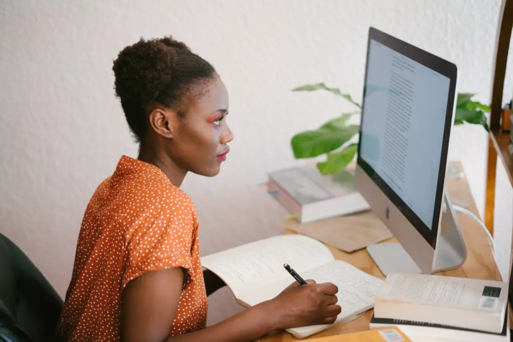 photo-of-woman-looking-on-computer