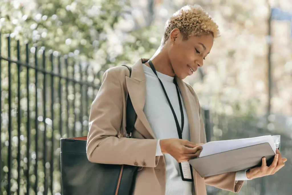 sellmax review photo of woman reviewing a sales proposal