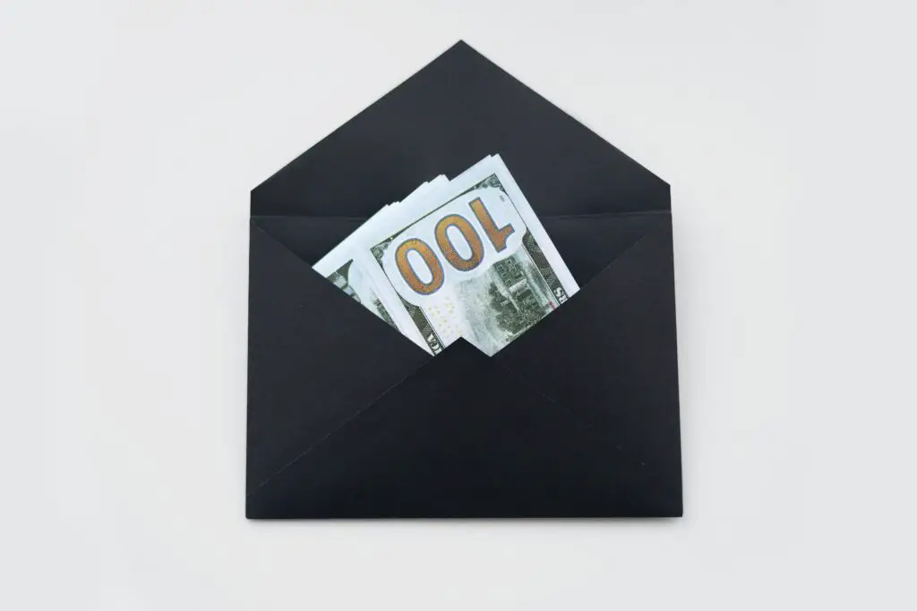 black envelope with cash