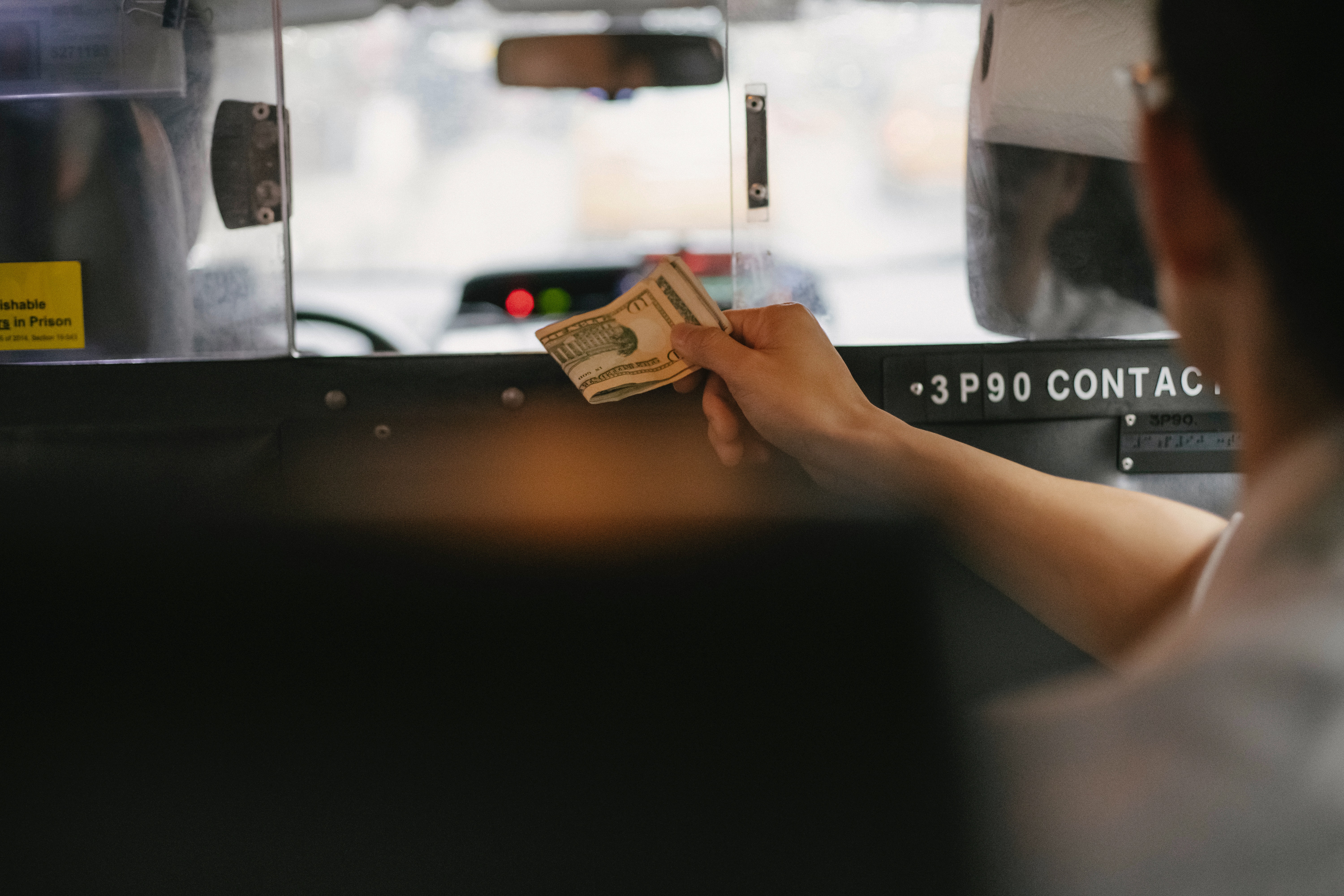 photo of passenger paying driver