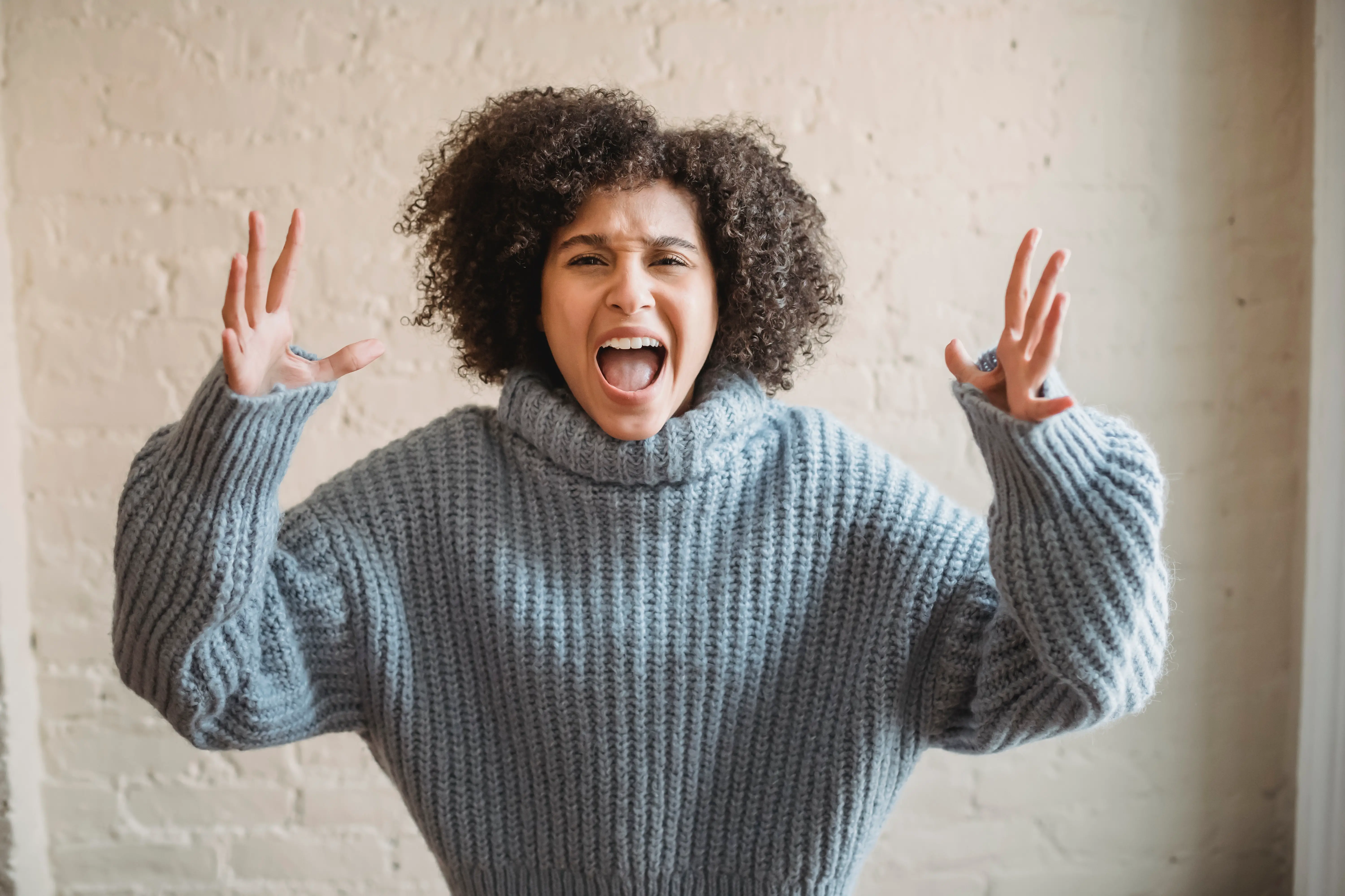 why can't I save money photo of young woman close to shouting