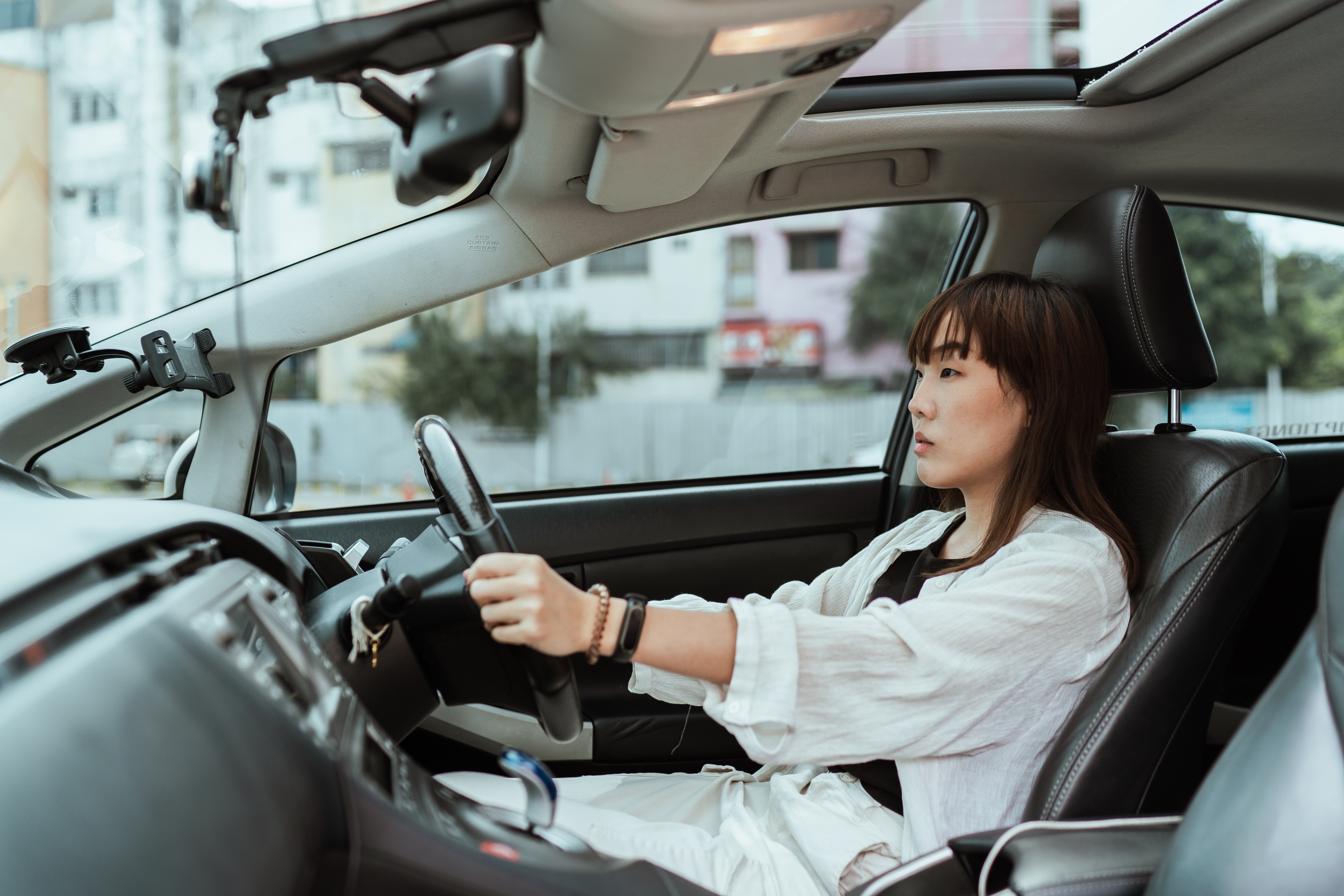photo of a woman driving