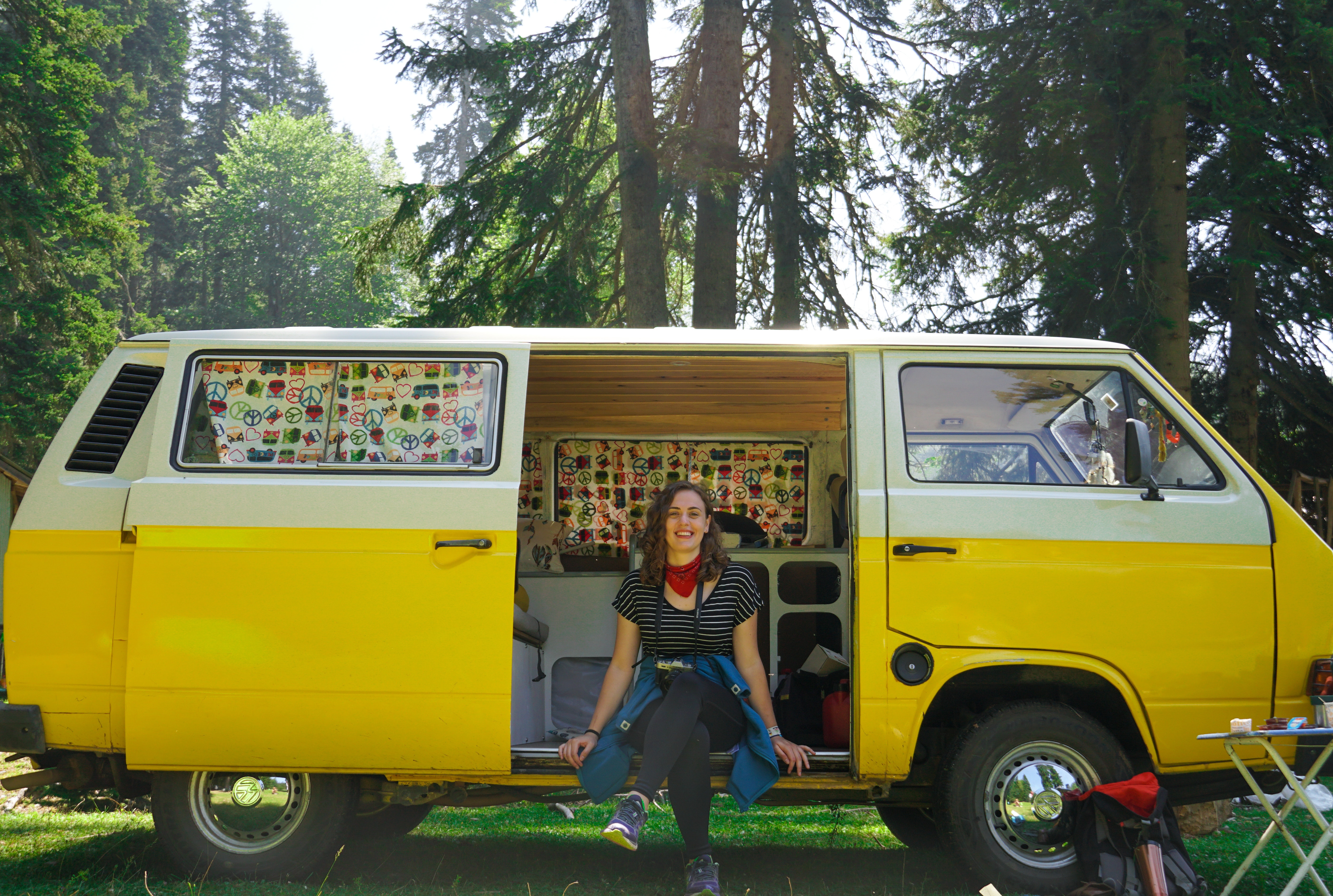 photo of a woman smiling in a van