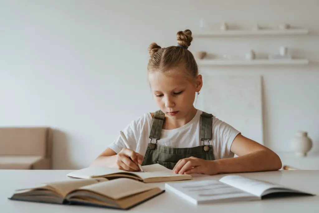 greenlight kids app-photo of a child doing homework